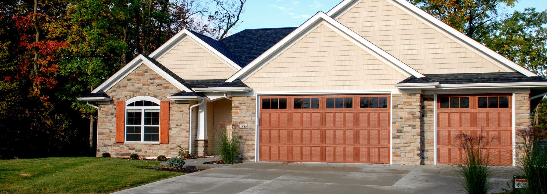 Distinctive maintenance free Carriage House designs available in stained and painted finishes.