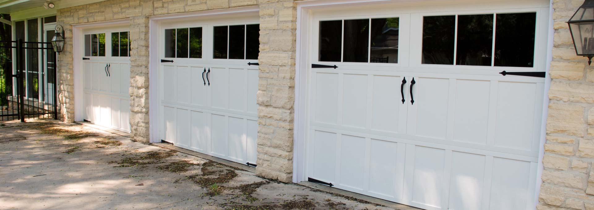 Distinctive maintenance free Carriage House designs available in stained and painted finishes.