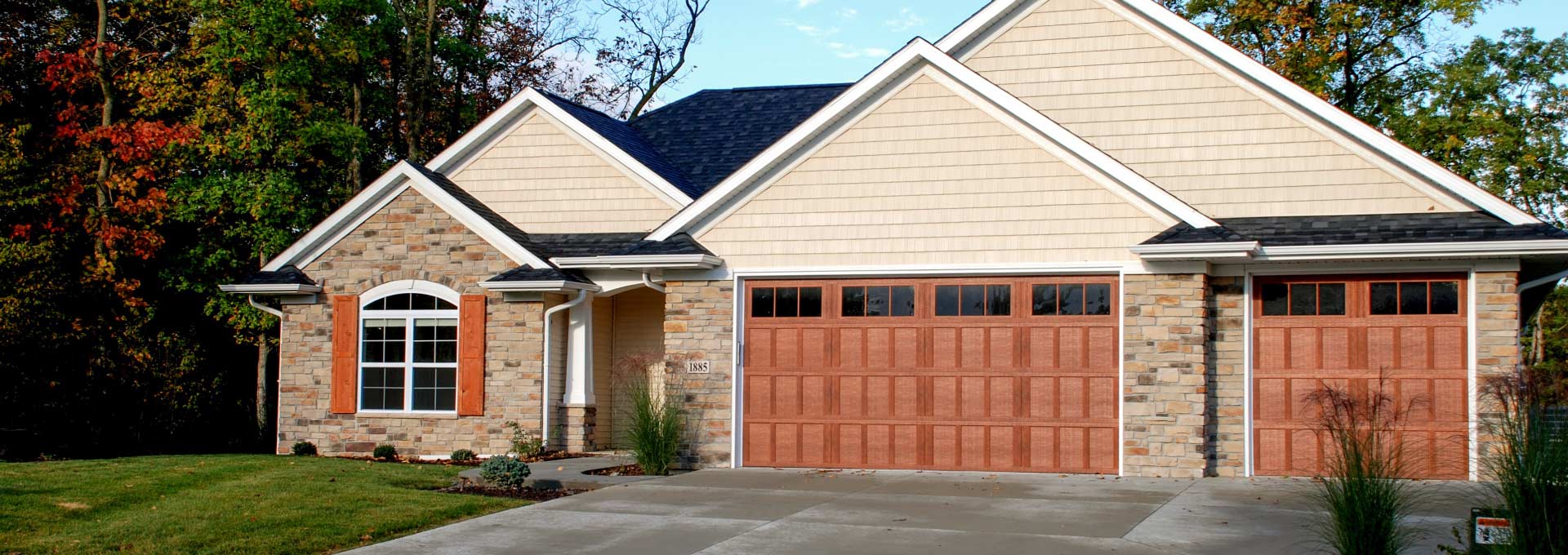 The unique look of stained wood on a maintenance free metal door.