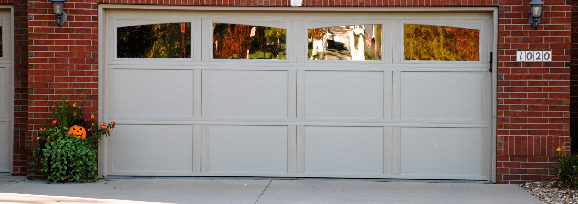 The unique look of stained wood on a maintenance free metal door.