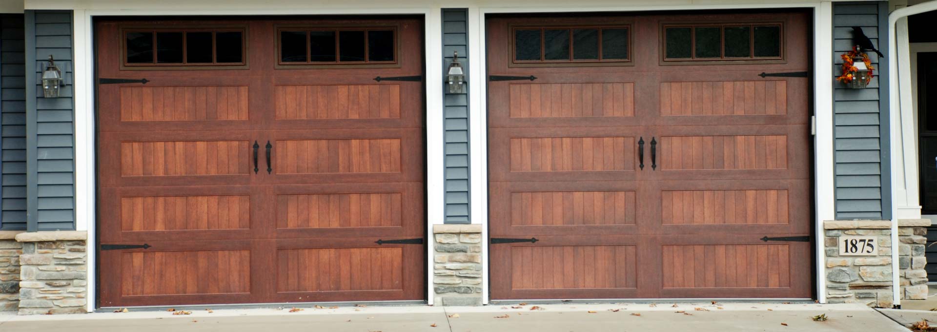 The unique look of stained wood on a maintenance free metal door.