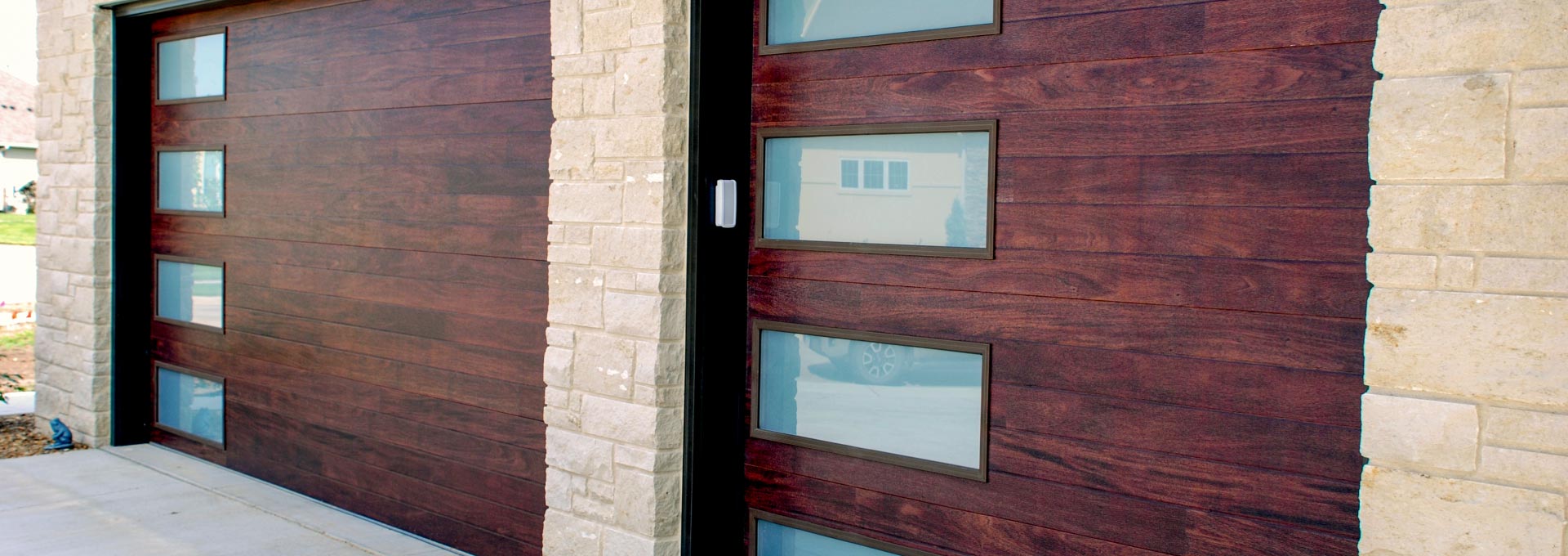The unique look of stained wood on a maintenance free metal door.