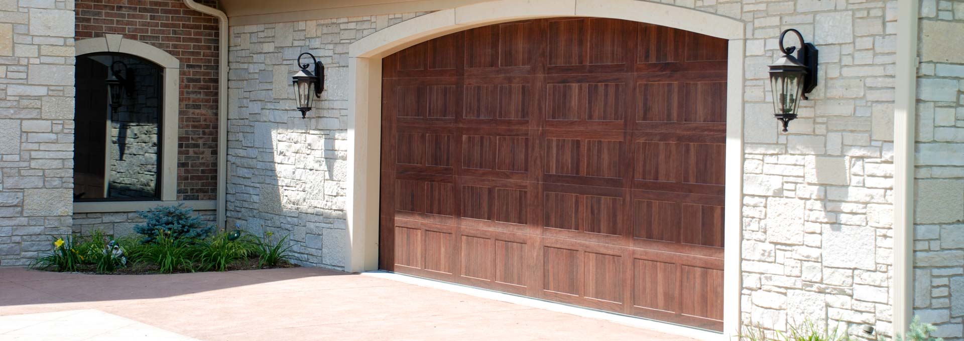 The unique look of stained wood on a maintenance free metal door.
