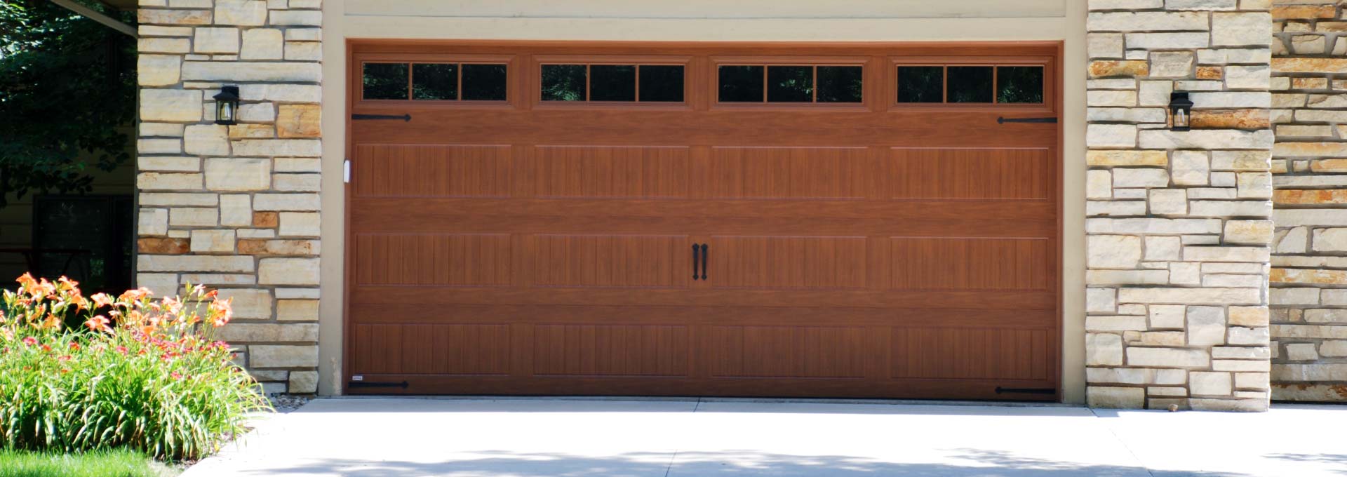 The unique look of stained wood on a maintenance free metal door.