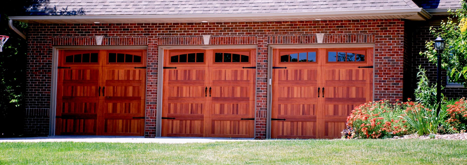 The unique look of stained wood on a maintenance free metal door.