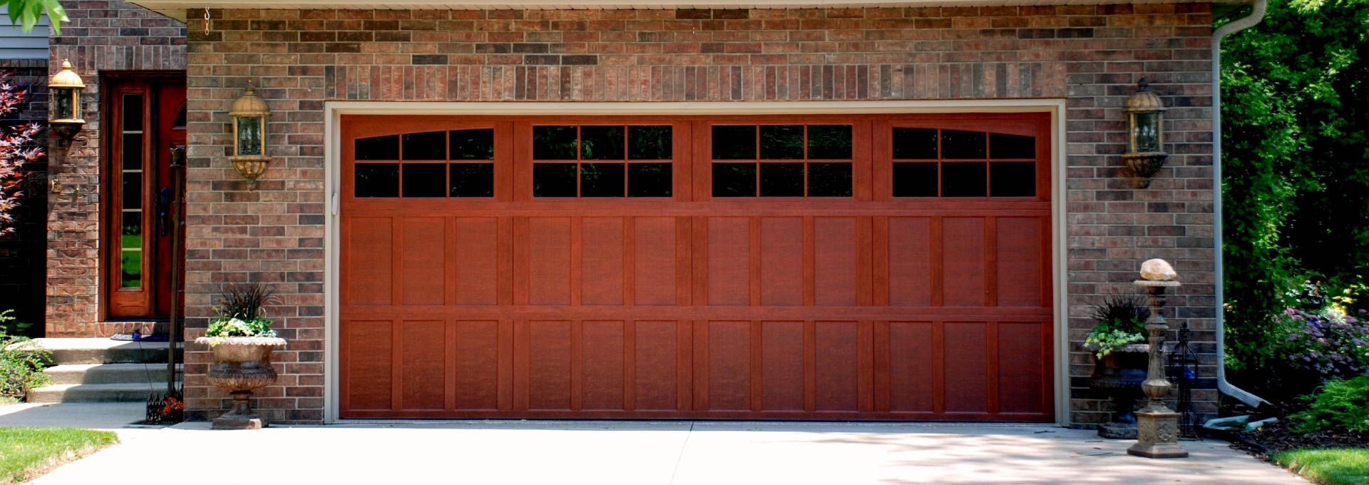 The unique look of stained wood on a maintenance free metal door.