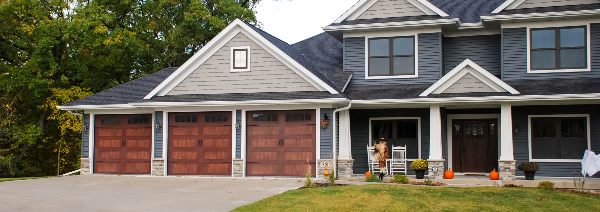 The unique look of stained wood on a maintenance free metal door.