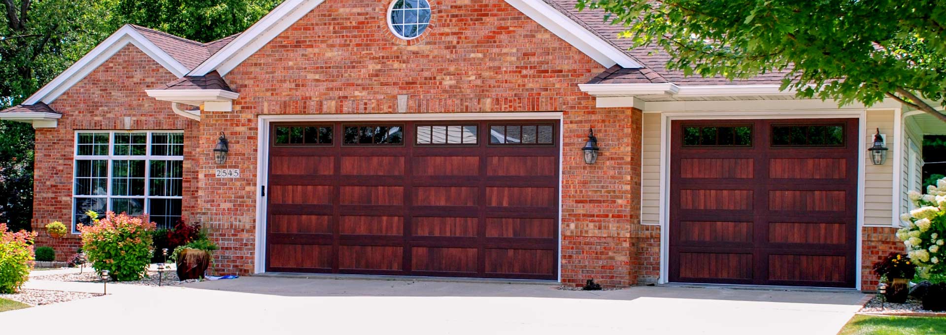 The unique look of stained wood on a maintenance free metal door.